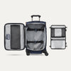 Vue intérieure de la valise à roulettes Travelpro Crew Classic Spinner, couleur Patriot Blue, montrant les pochettes de rangement et les sangles de maintien.