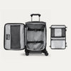 Open suitcase featuring packing organizer on a white background