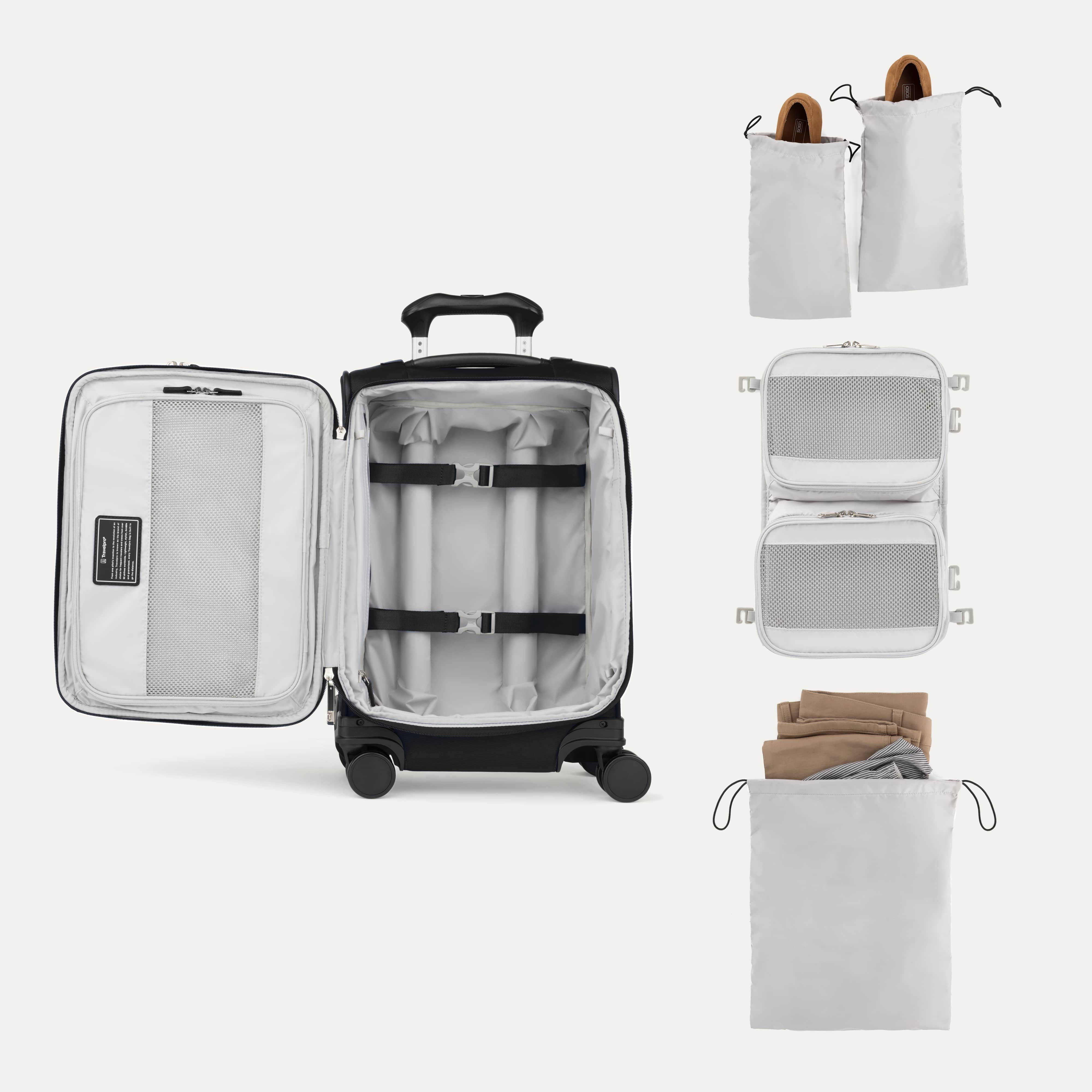 Interior of Travelpro Versapack Luggage in Black, with shoe bags, packing cubes, and removable laundry bag.