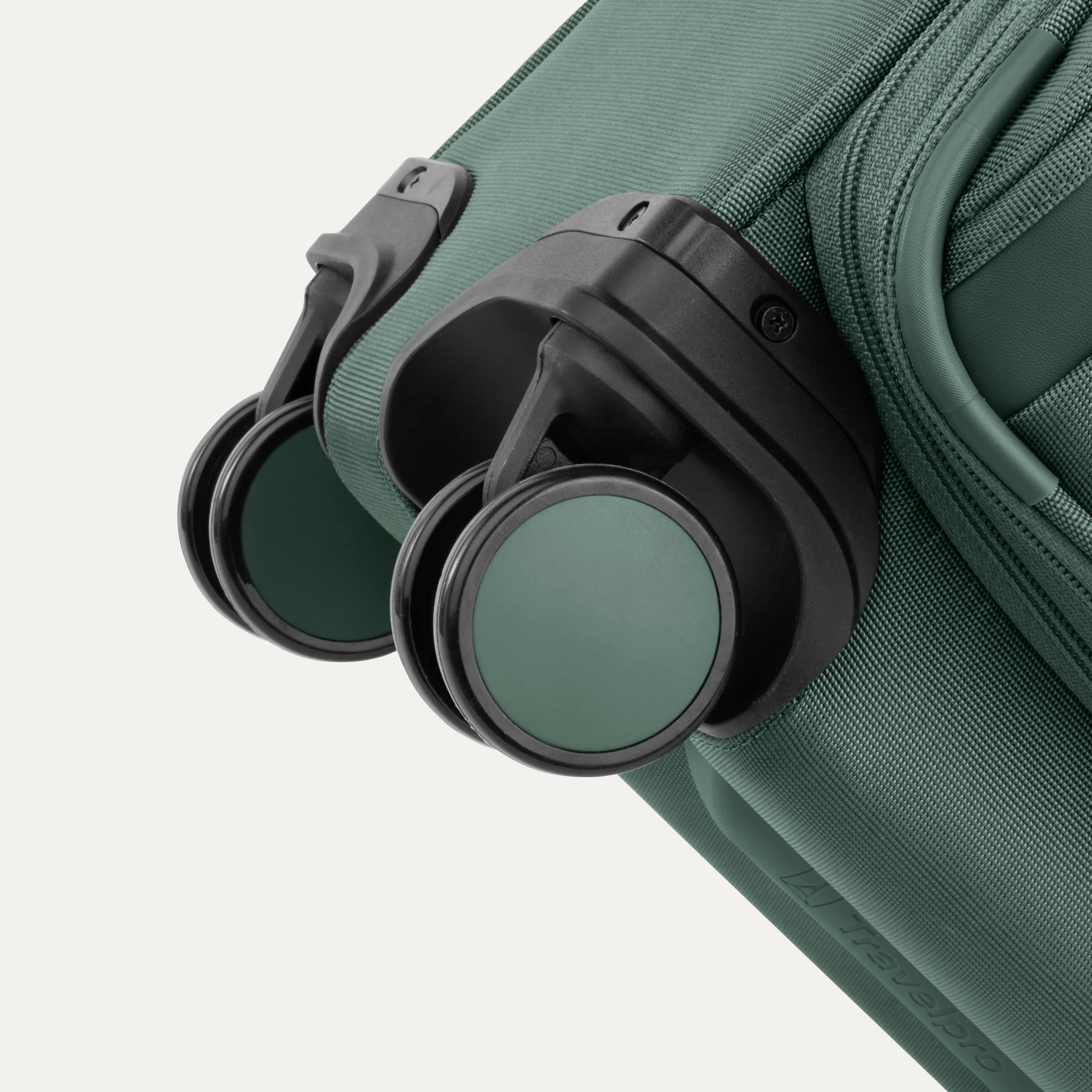 Dual spinner wheels on a Travelpro Versapack in Desert Sage Green, designed for smooth, multi-directional rolling.