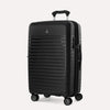 Valise noire avec le logo de la marque bien visible sur un fond gris clair