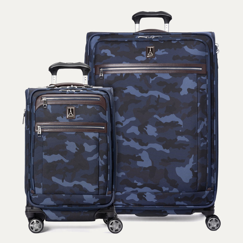 A set of two Platinum Elite luggage items, a carry-on and a large check-in bag, with camouflage pattern, spinner wheels, and TSA-compliant locks.