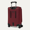 Valise rouge à roulettes et poignée sur fond blanc
