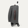 Side view of expanded gray suitcase with black wheels and handle on a white background