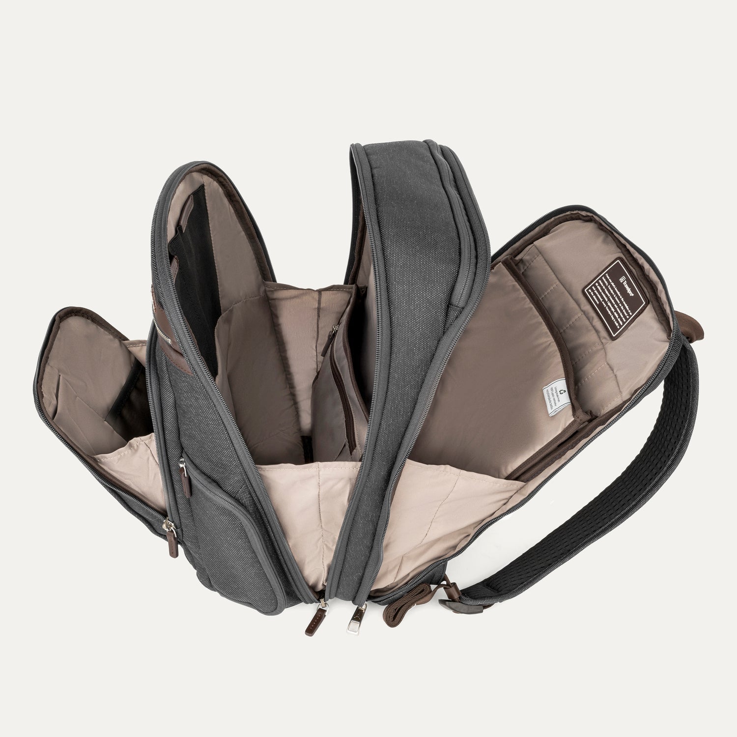 Grey backpack with all of the compartments open on a white background