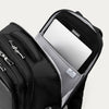 Black backpack laptop sleeve compartment open on a white background