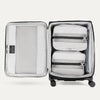Open spinner suitcases in black , showing the interior compartments on a white background