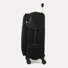 Side view of black suitcase with handle and wheels on a white a background