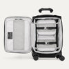 Black open suitcase with organizer strap down on a white background