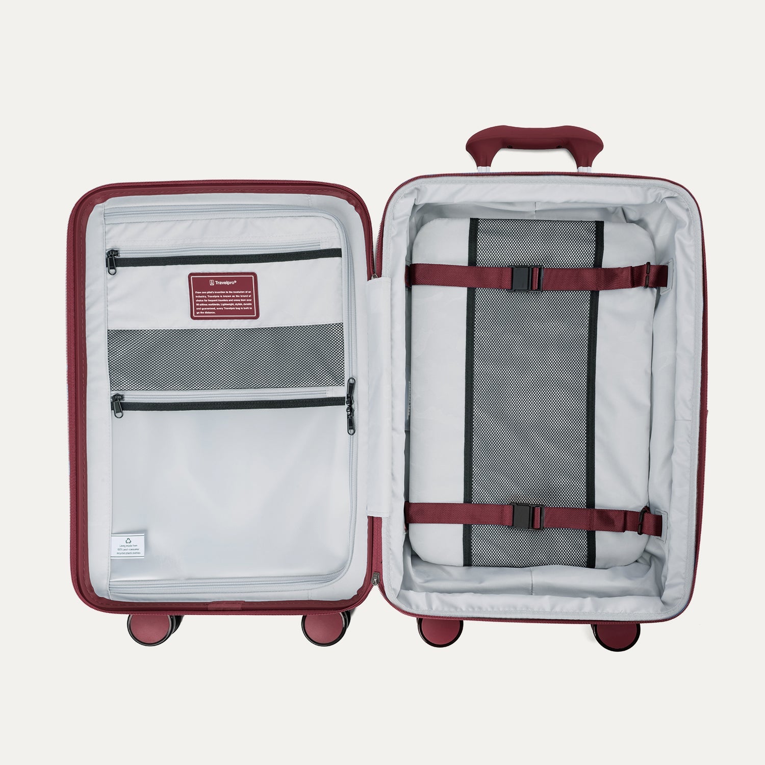 Open red suitcase with interior organization panels on a white background