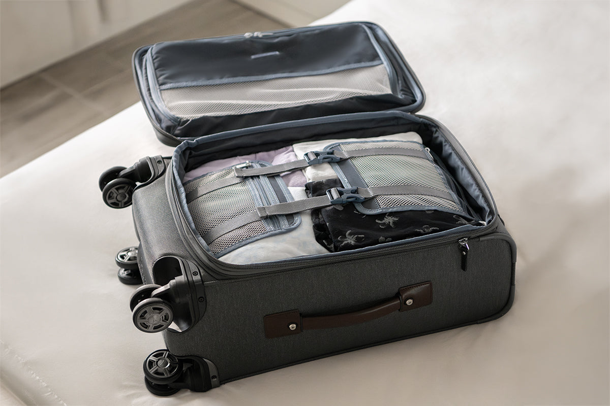  Travelpro carry-on suitcase with tie-down straps to secure clothing