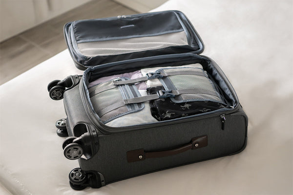  Travelpro carry-on suitcase with tie-down straps to secure clothing