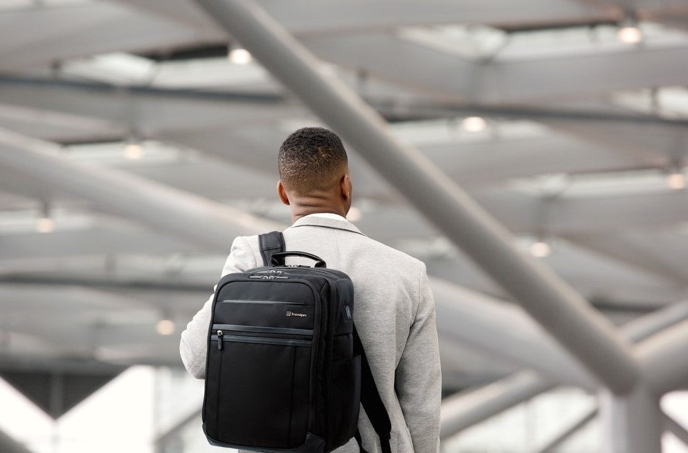 Man holding a backpack