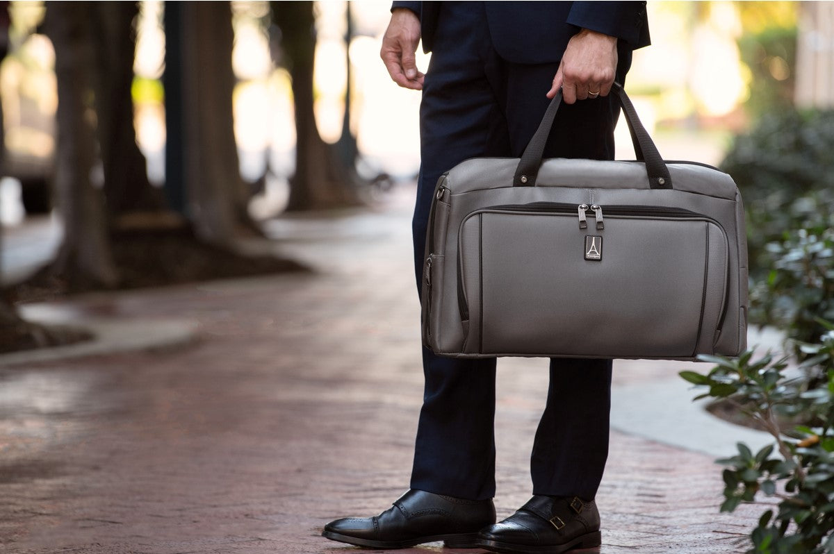 Man holding a duffel bag
