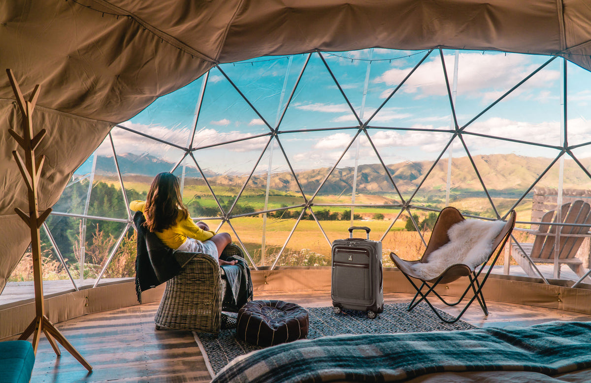 Woman sitting in luxury tent