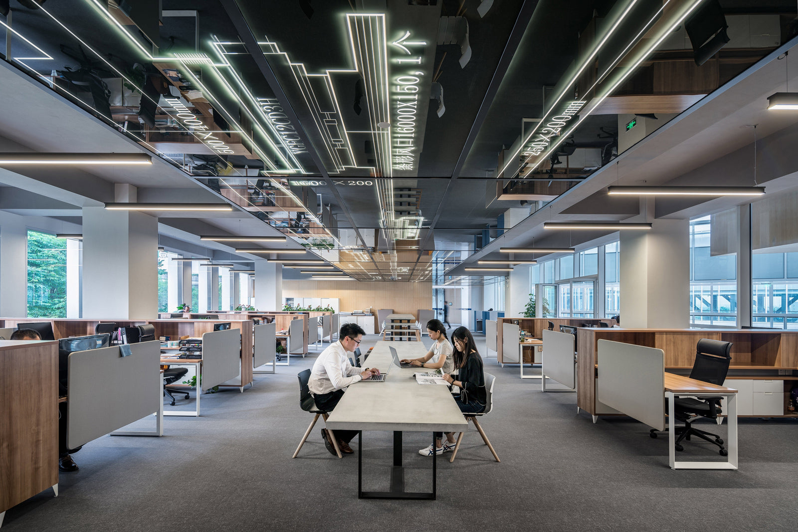 group of people working in an open office