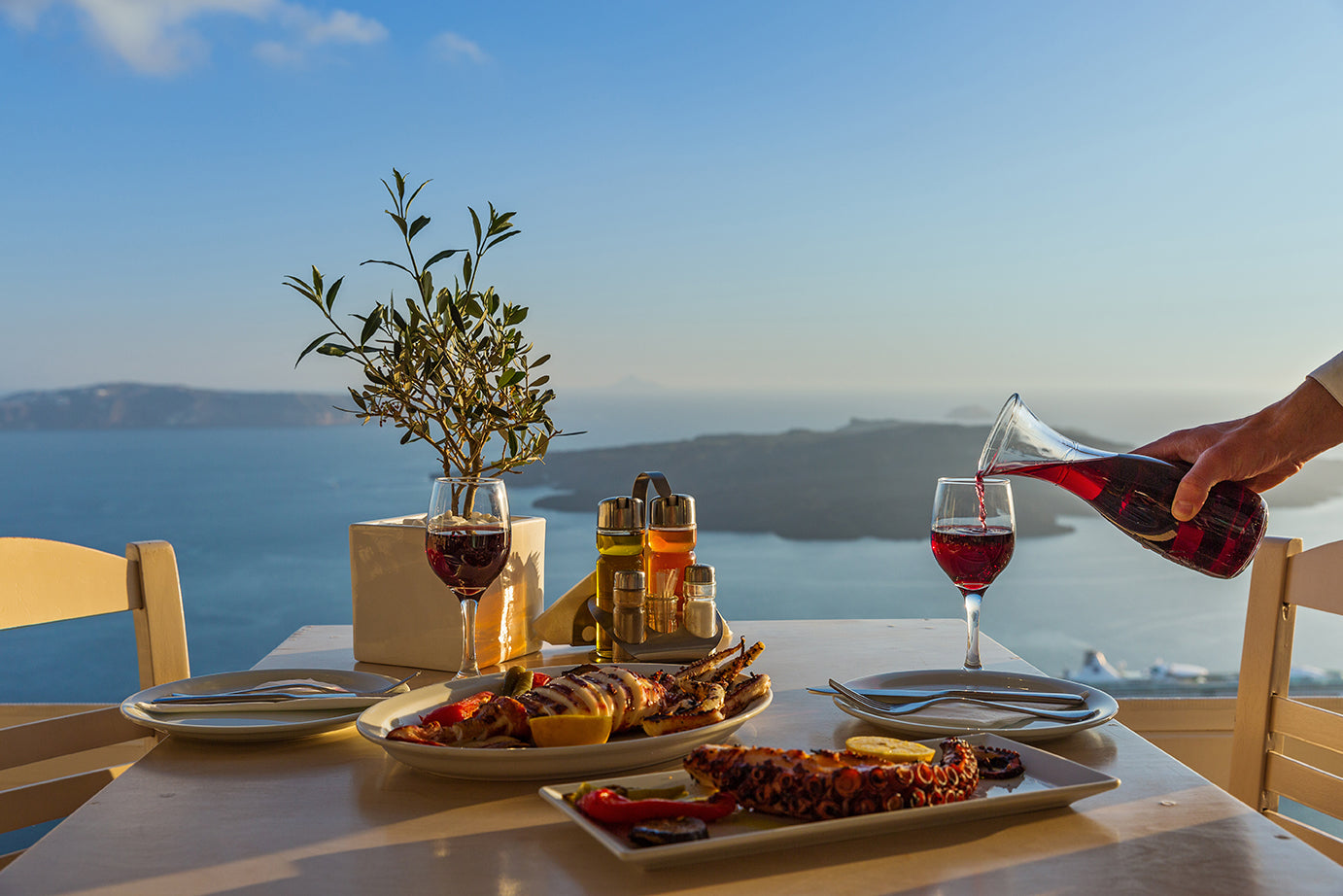 Dinner served for two, overlooking the ocean