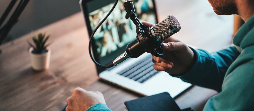 person with a microphone at home