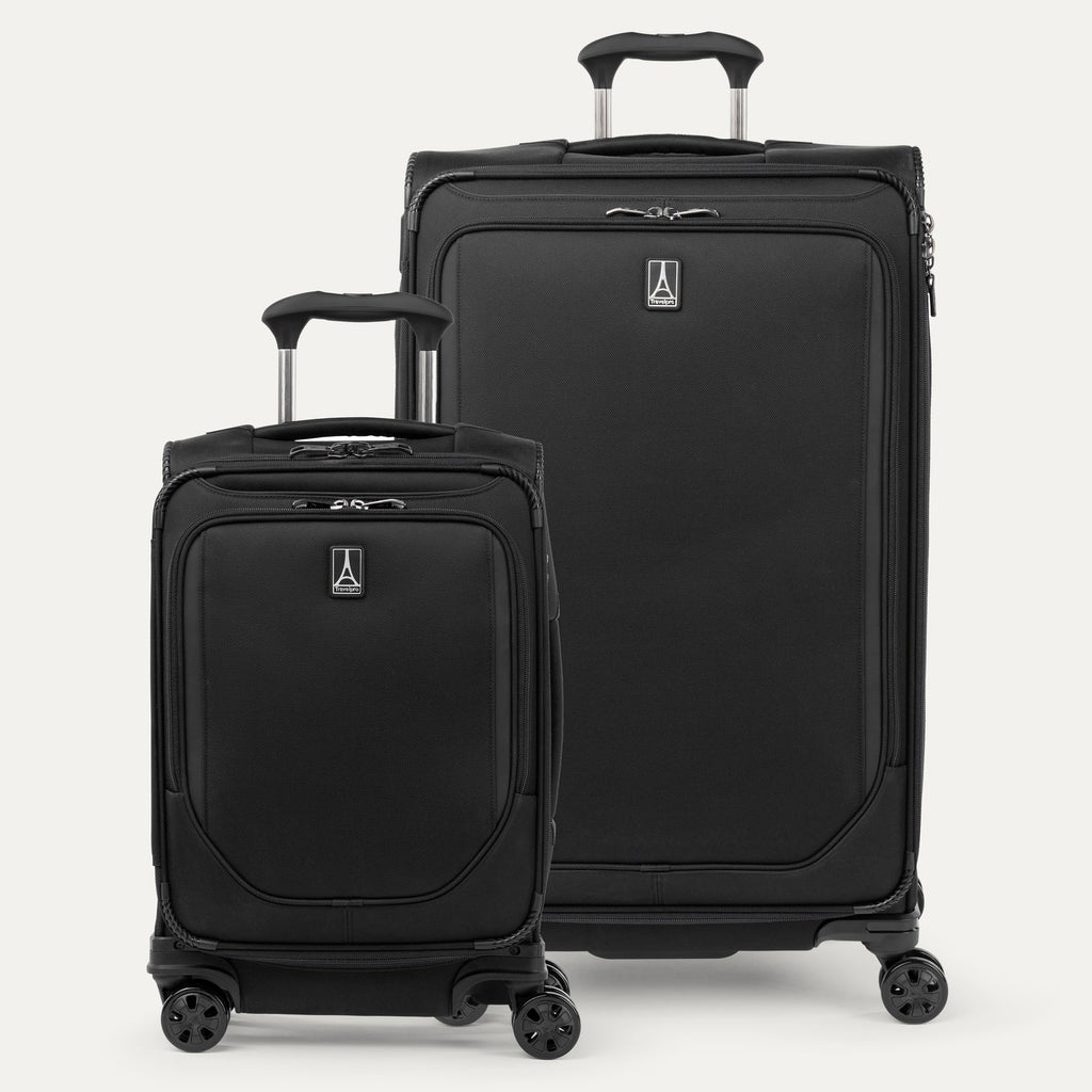 Vue de face de l'ensemble Travelpro Crew Classic comprenant Classic et une valise à roulettes pour les bagages en soute, toutes deux de couleur noire et équipées dePoignées extensibles PowerScope .