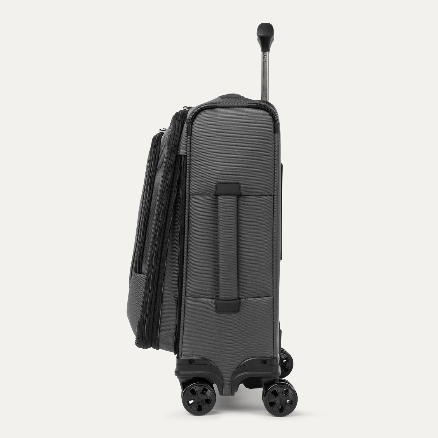 Side view of expanded gray suitcase with black wheels and handle on a white background