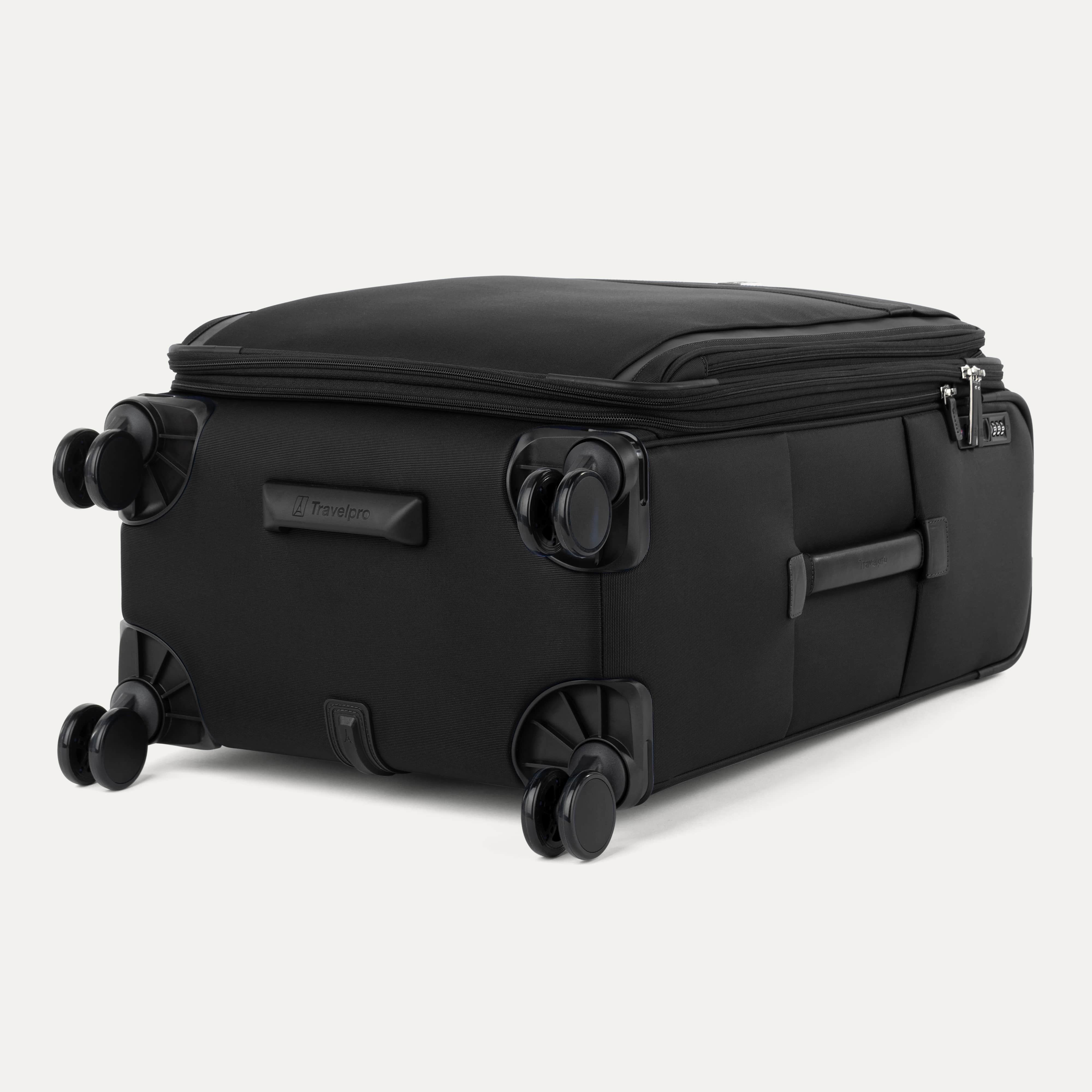 Bottom view of the Travelpro Versapack Checked Expandable Spinner in Black, showing 360° Spinner Wheels