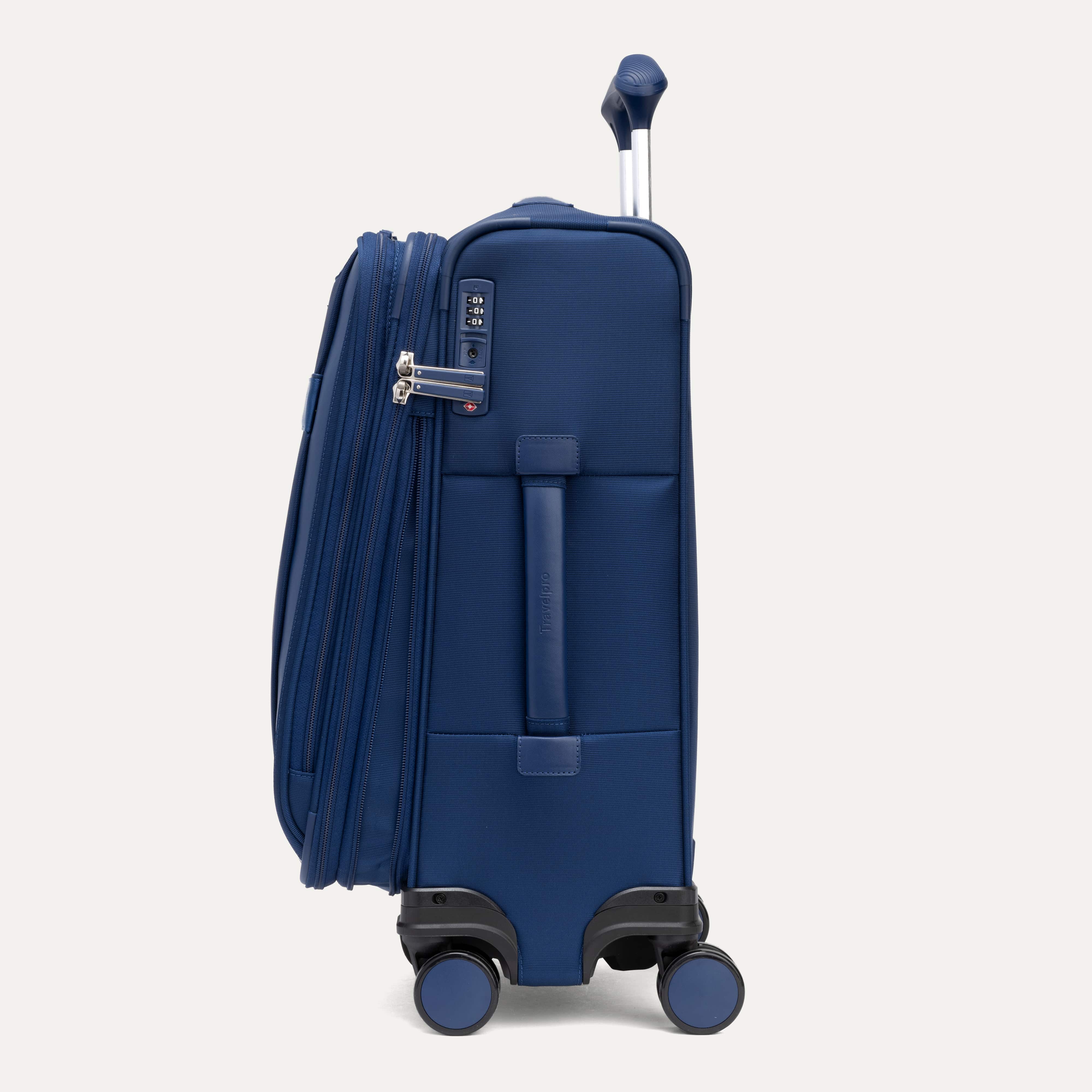 Side view of Travelpro Versapack Carry-On Expandable Spinner in Estate Blue, featuring TSA Approved Locks and Zippers.
