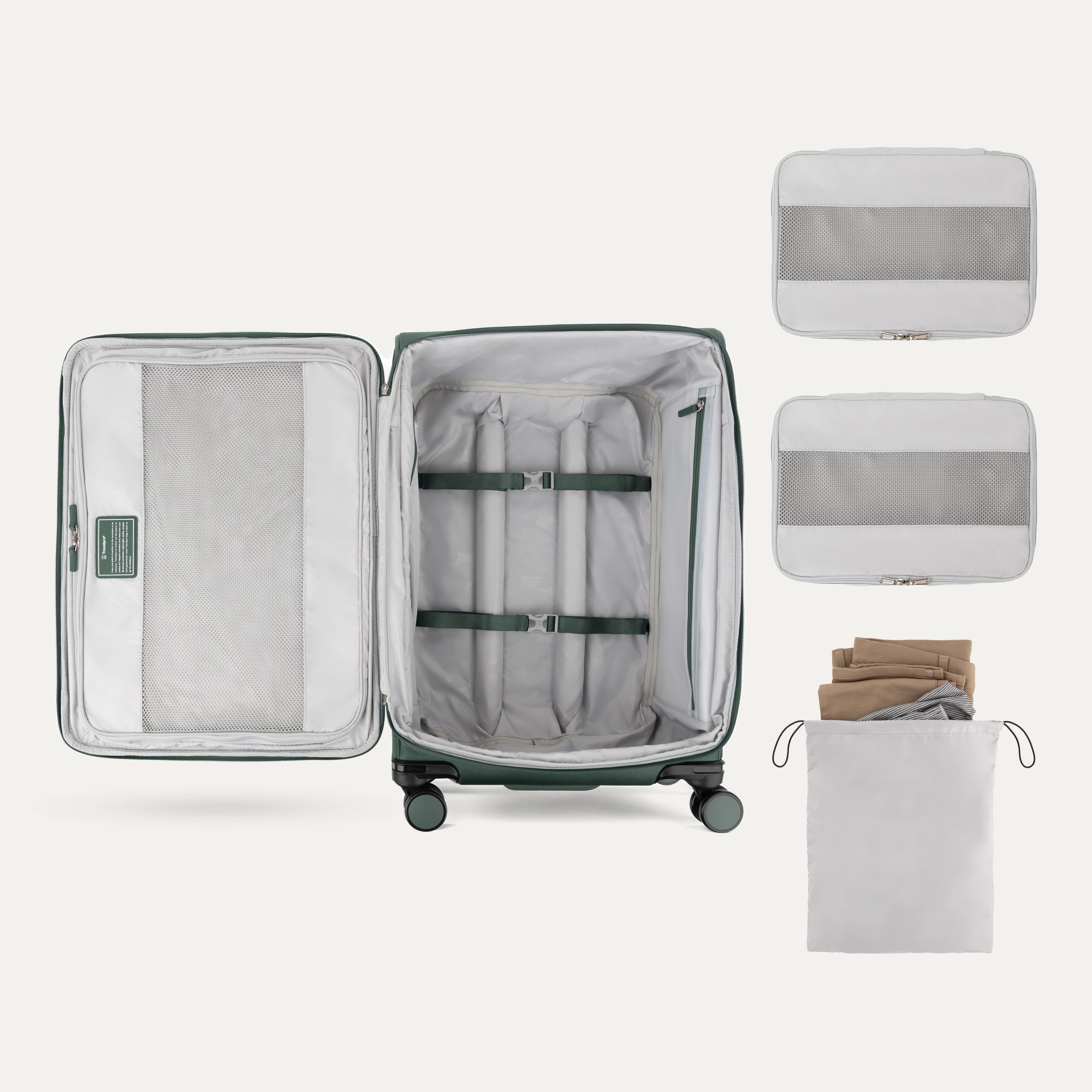 Interior of Travelpro Versapack Checked Luggage in Desert Sage Green, showing packing cubes, laundry bag, and adjustable hold-down straps.