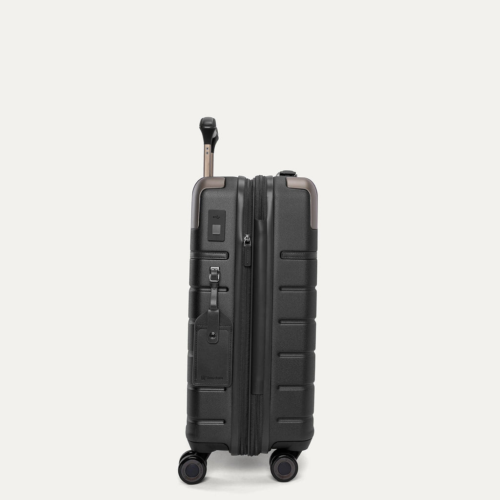 Side profile of the Travelpro Platinum Reserve Compact Carry-On Hardside Spinner in Black Dust