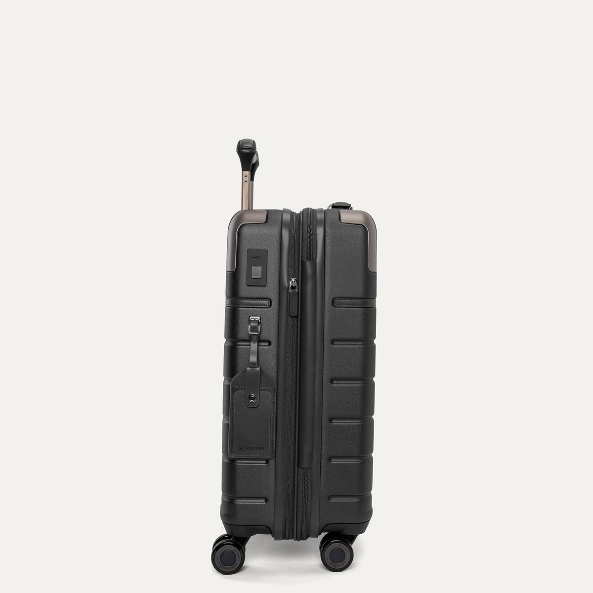 Side profile of the Travelpro Platinum Reserve Compact Carry-On Hardside Spinner in Black Dust