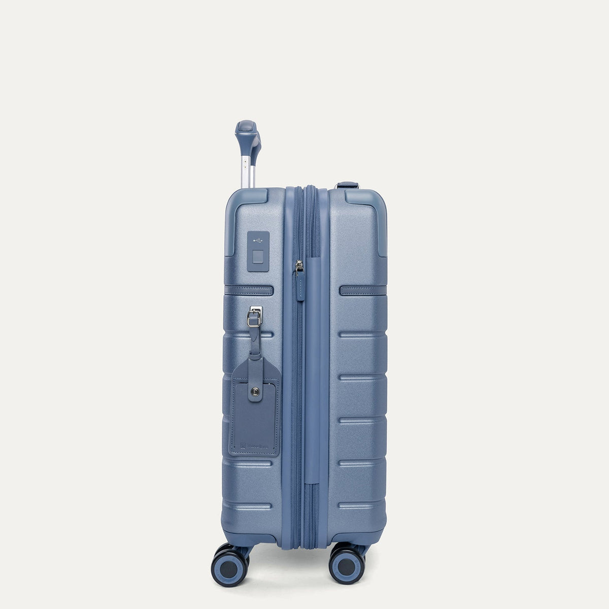 Side profile of the Travelpro Platinum Reserve Compact Carry-On Hardside Spinner in Steel Blue