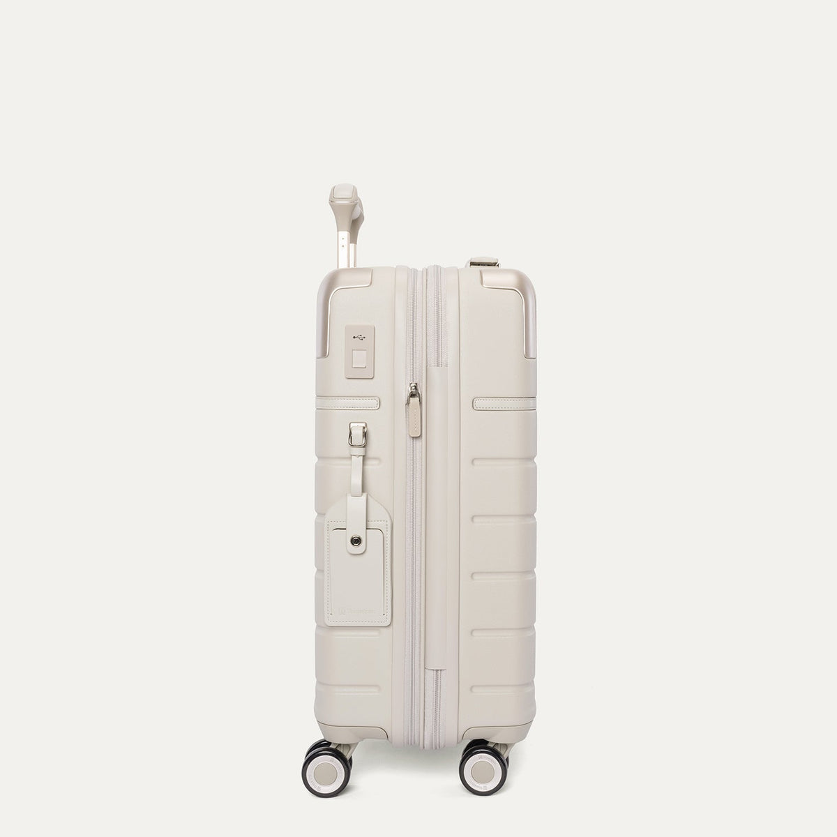 Side profile of the Travelpro Platinum Reserve Compact Carry-On Hardside Spinner in Sandstone