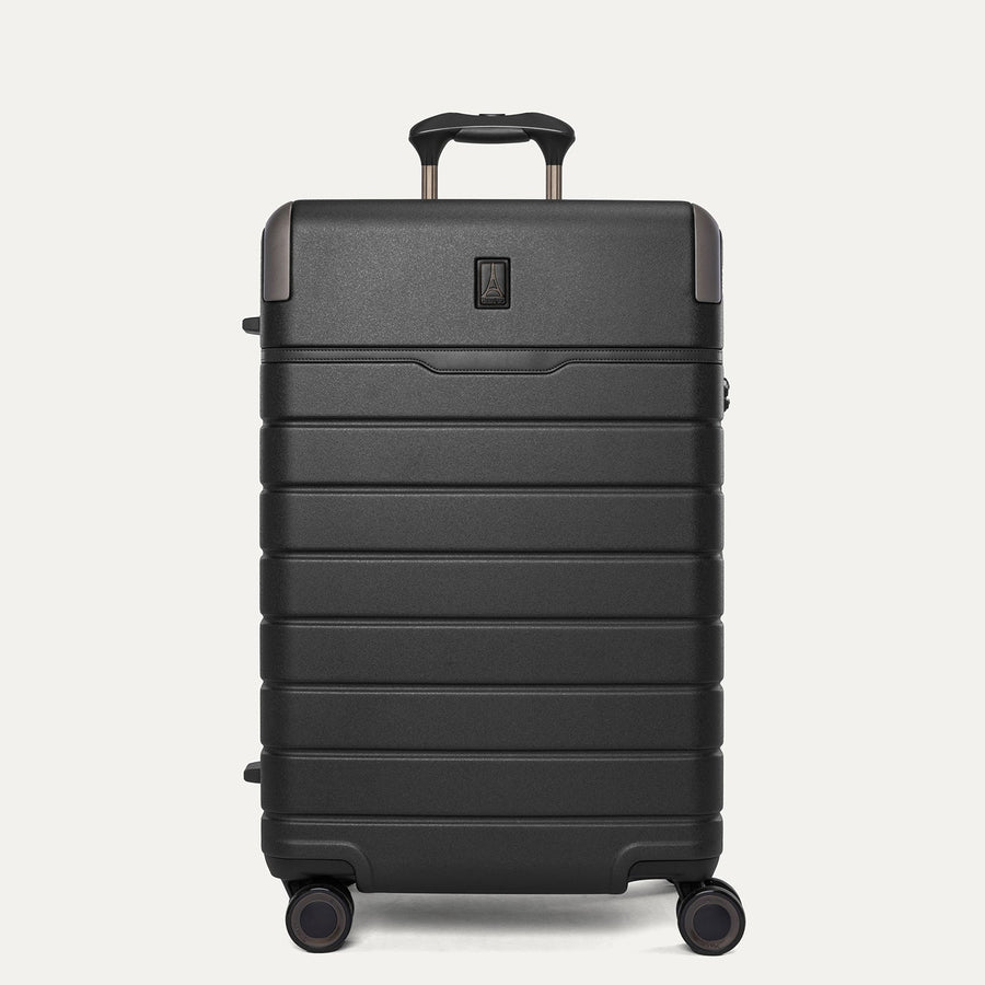 Front view of the Travelpro Platinum Reserve Medium Check-In Hardside Spinner in Black Dust