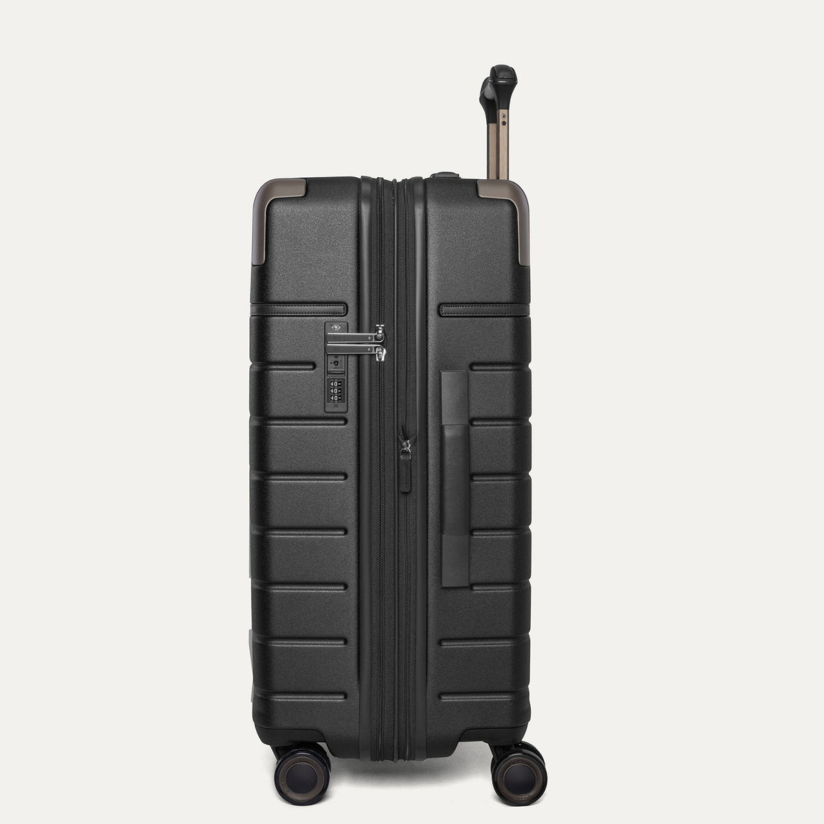 Side profile of the Travelpro Platinum Reserve Medium Check-In Hardside Spinner in Black Dust