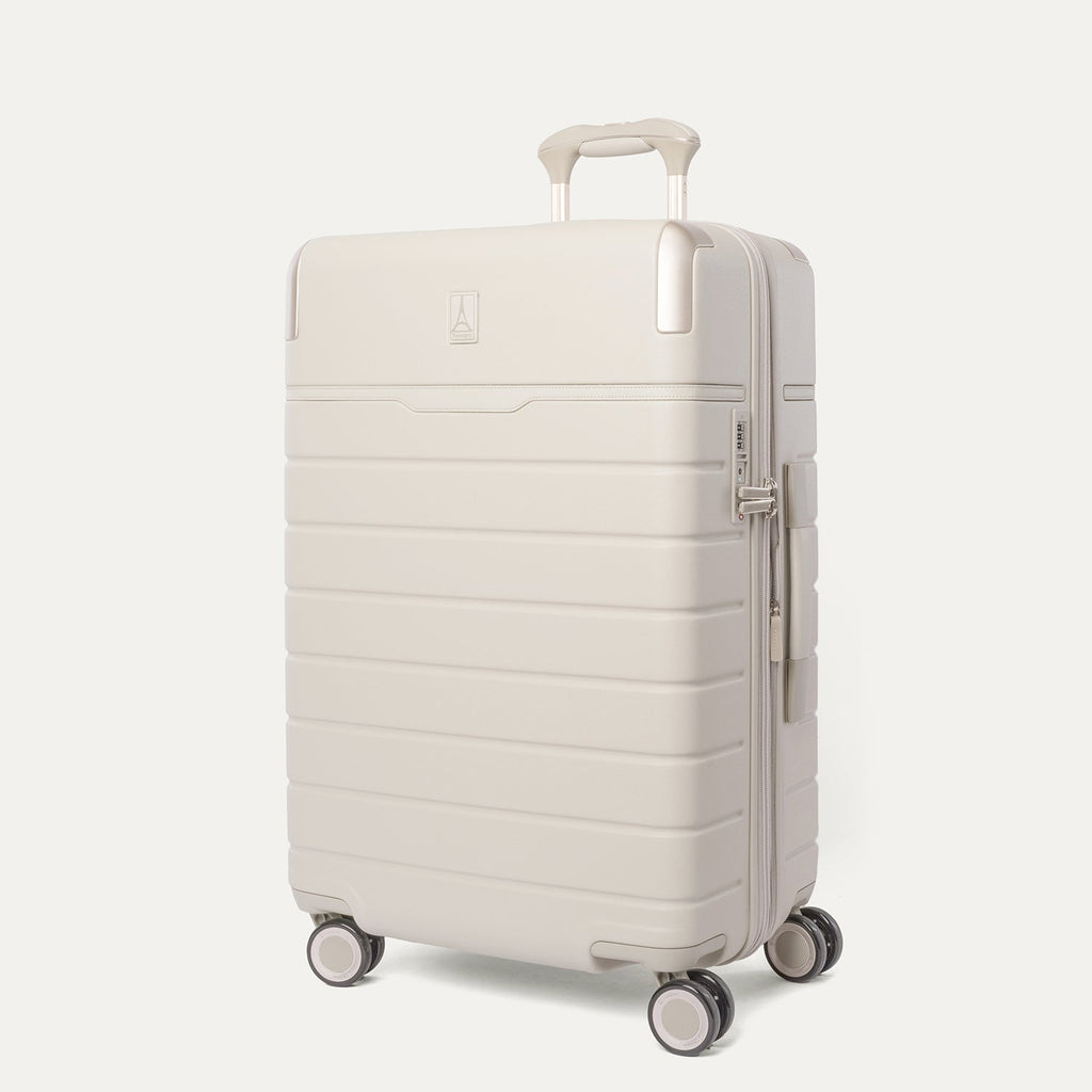 Three-quarter angled view of the Travelpro Platinum Reserve Medium Check-In Hardside Spinner in Sandstone