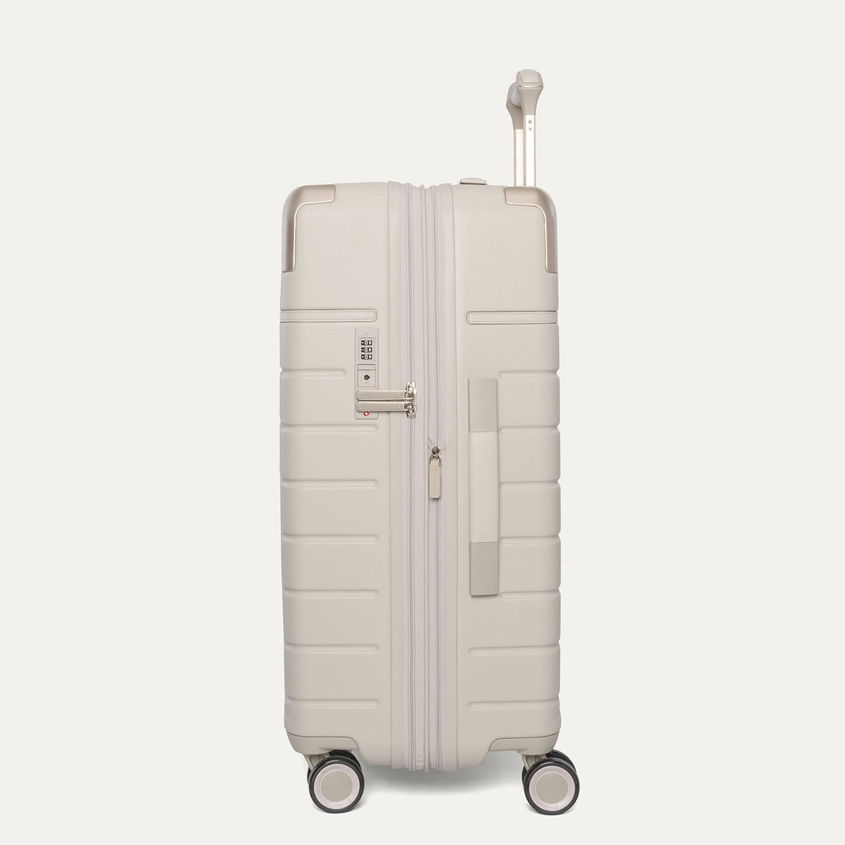 Side profile of the Travelpro Platinum Reserve Medium Check-In Hardside Spinner in Sandstone