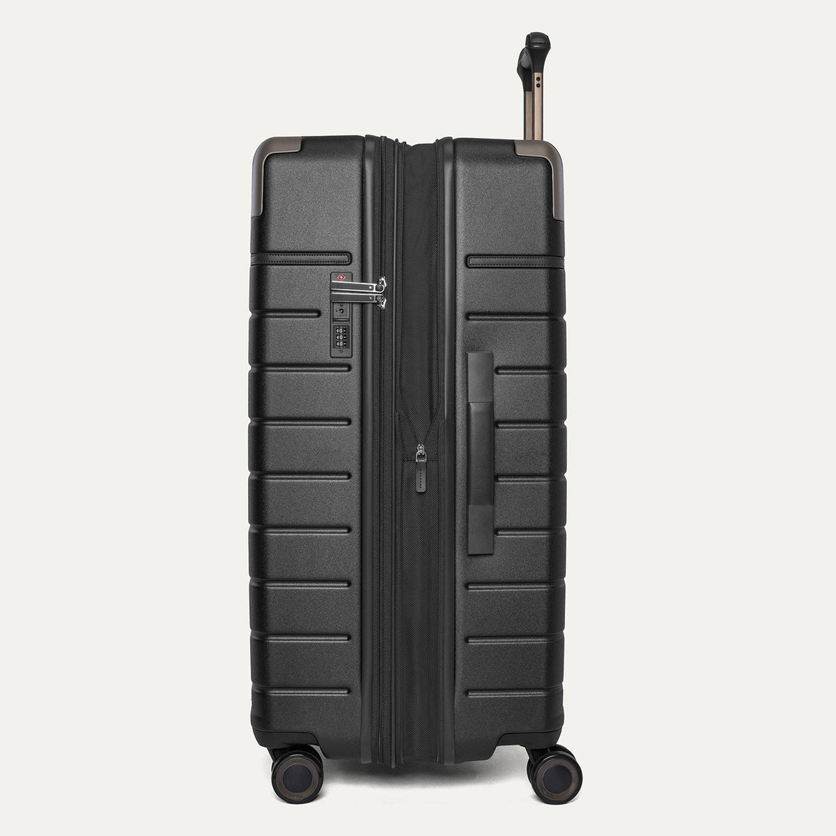 Side profile of the Travelpro Platinum Reserve Large Check-In Hardside Spinner in Black Dust, expanded for extra packing space