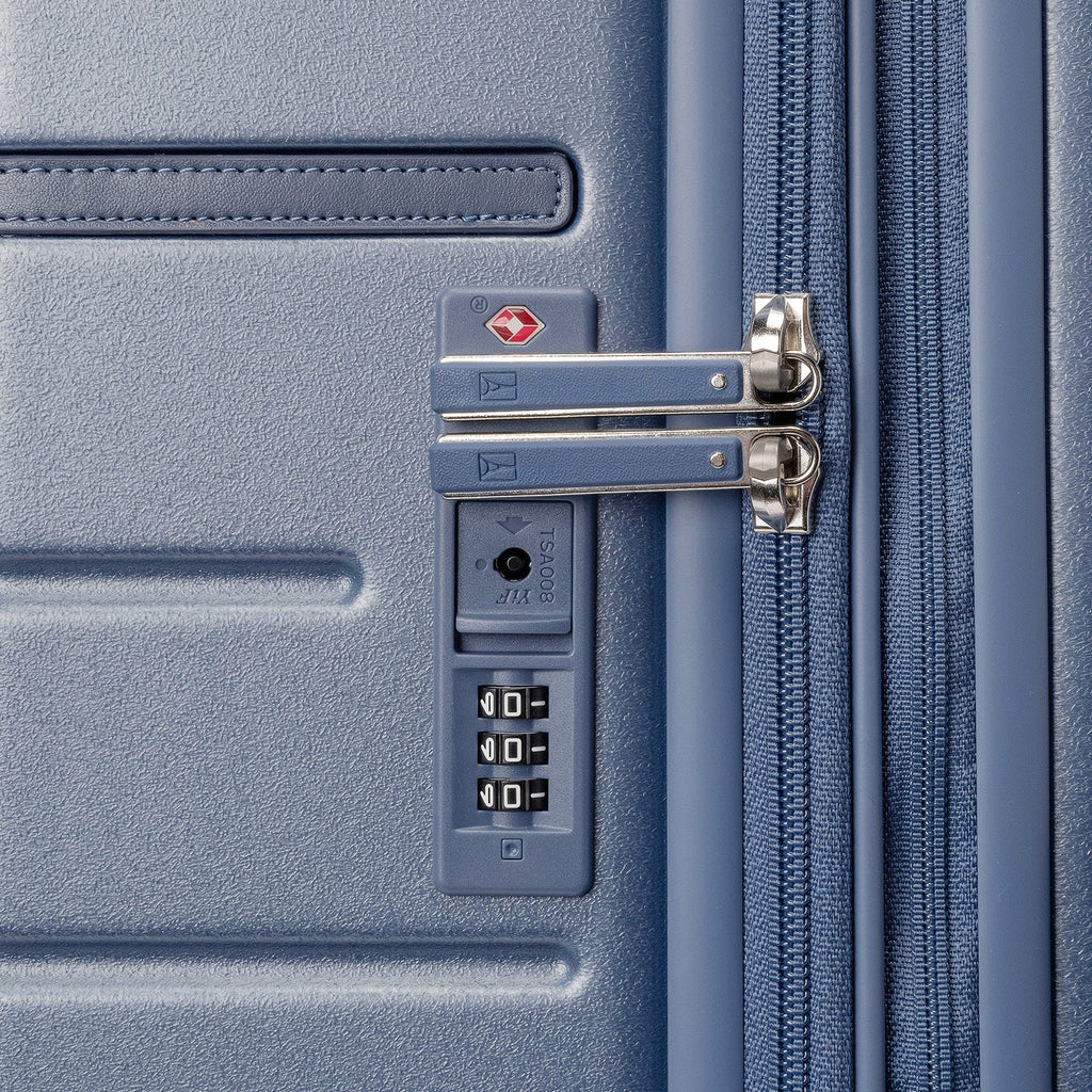 Close-up of the built-in TSA lock on the Travelpro Platinum Reserve Large Check-In Hardside Spinner in Steel Blue
