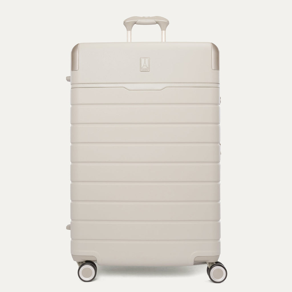 Front view of the Travelpro Platinum Reserve Large Check-In Hardside Spinner in Sandstone
