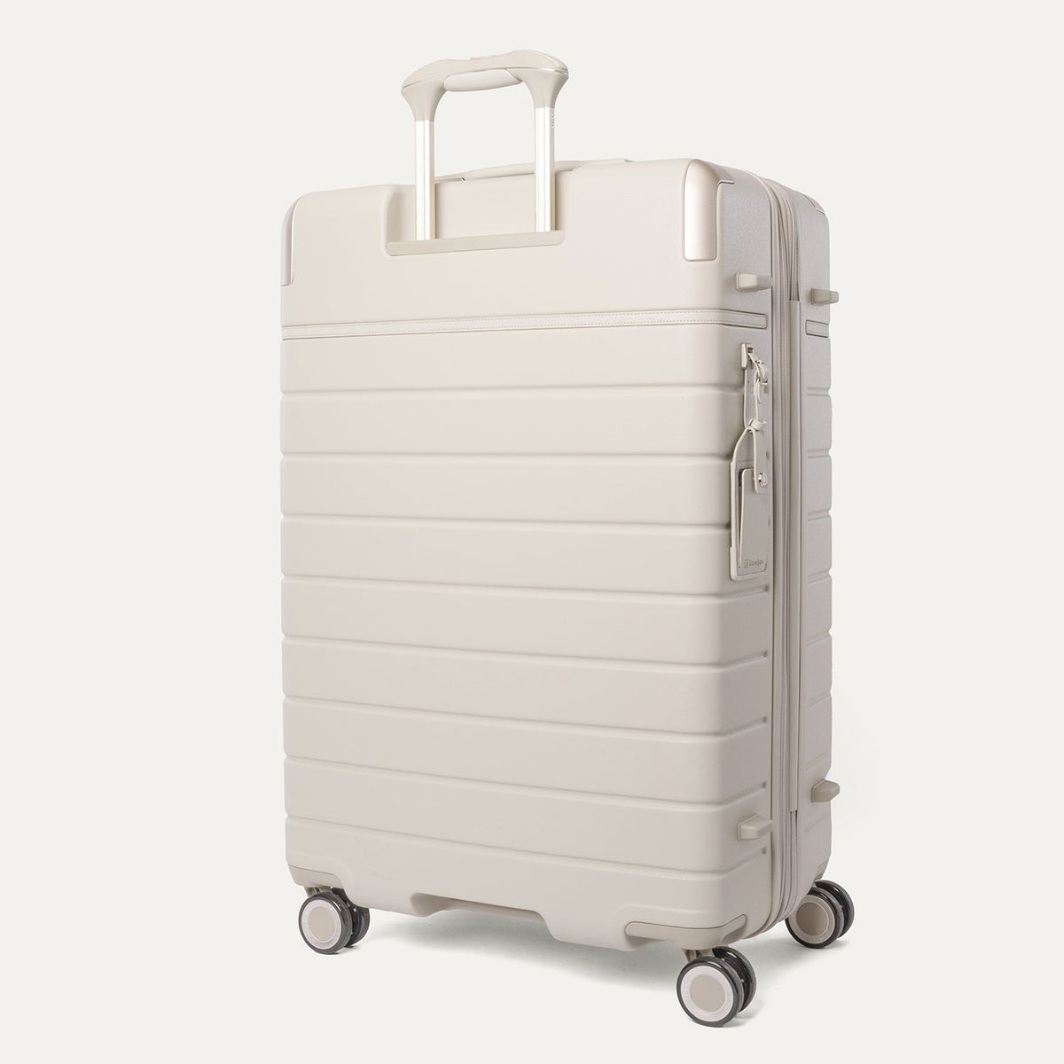 Rear angled view of the Travelpro Platinum Reserve Large Check-In Hardside Spinner in Sandstone