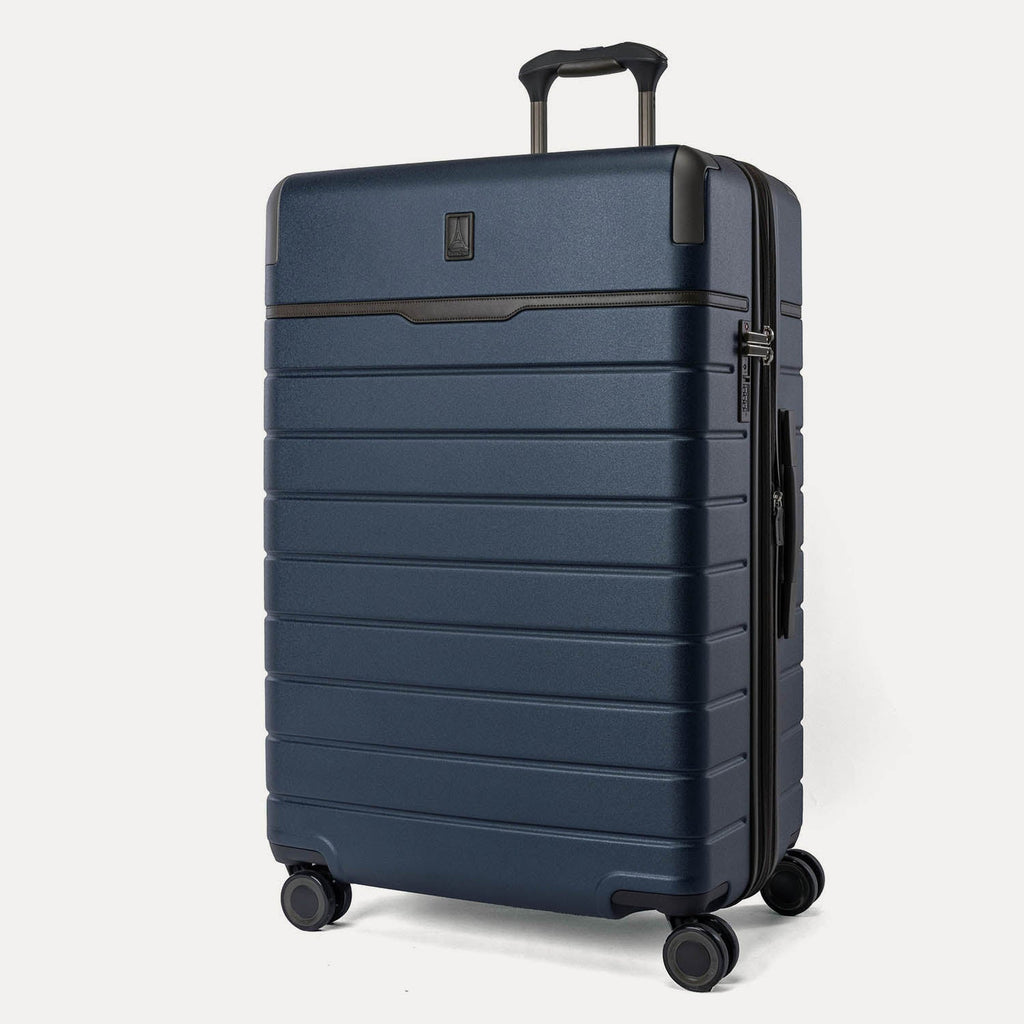 Three-quarter angled view of the Travelpro Platinum Reserve Large Check-In Hardside Spinner in Midnight Trail
