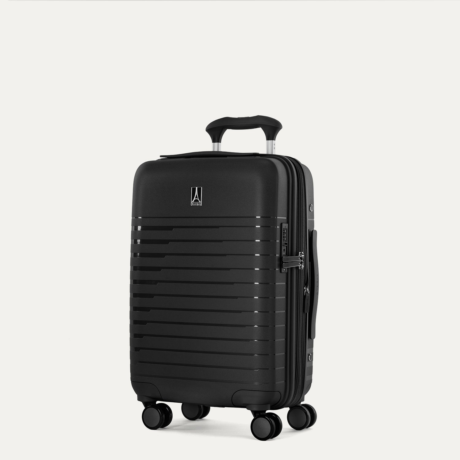 Valise noire à roulettes sur fond gris clair