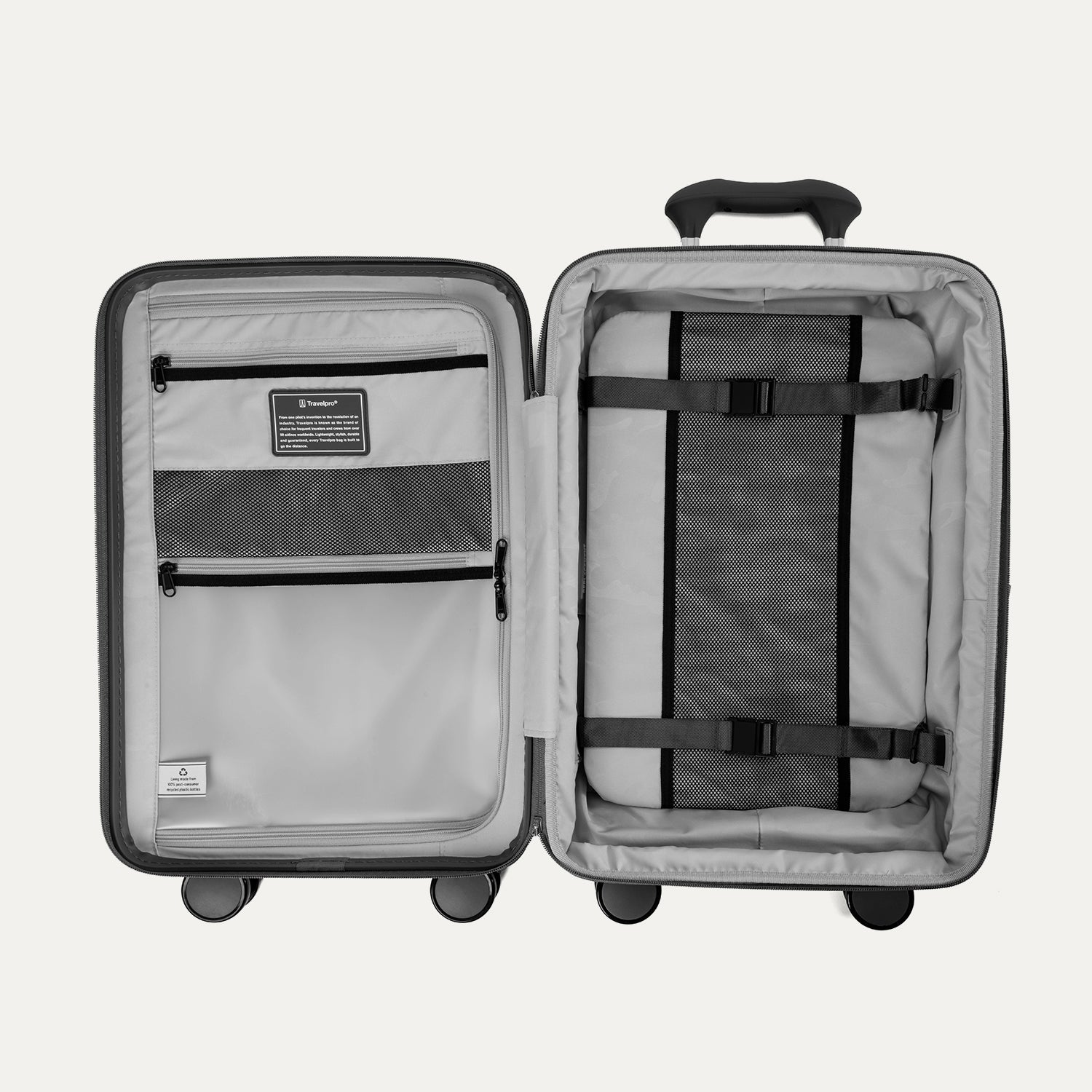 Valise ouverte avec des séparateurs intérieurs, sur fond blanc