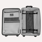 #color_black Open suitcase with interior organization panels on a white background