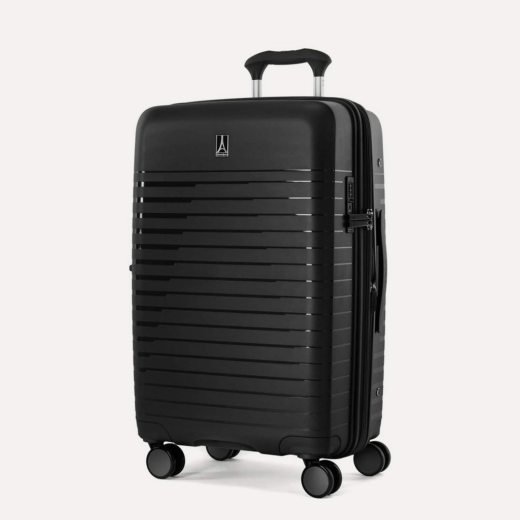 suitcase with a visible brand logo on a light gray background  #color_black