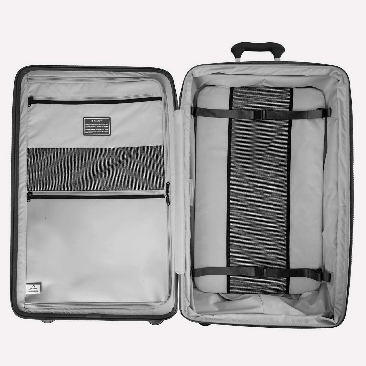 Valise grise ouverte avec des séparateurs intérieurs, sur fond blanc