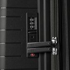 Close-up of a black suitcase with a combination lock and TSA lock. #color_black