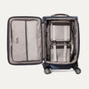 Interior view of the Travelpro Platinum Elite Carry-On Spinner in Camouflage, featuring mesh compartments and adjustable compression straps.

