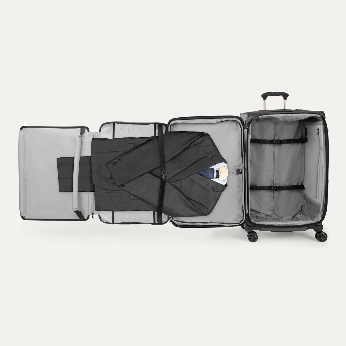 Interior view of the Travelpro Crew Classic Carry-On Spinner in Black, showing Organizational Pouches and adjustable hold-down straps.
