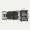 Open red suitcase with fold-out suiter on a white background