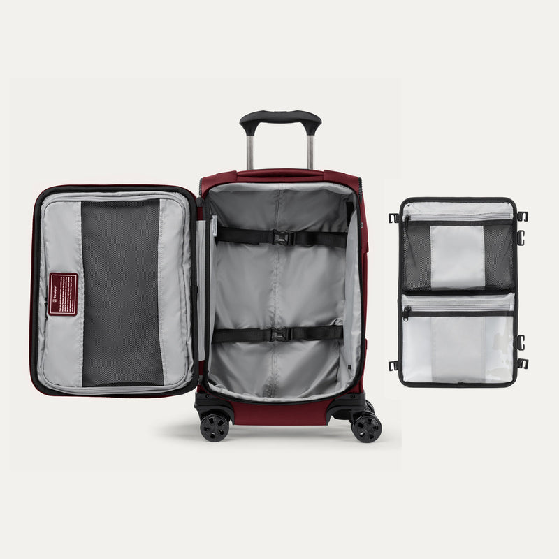Open suitcase featuring packing organizer on a white background